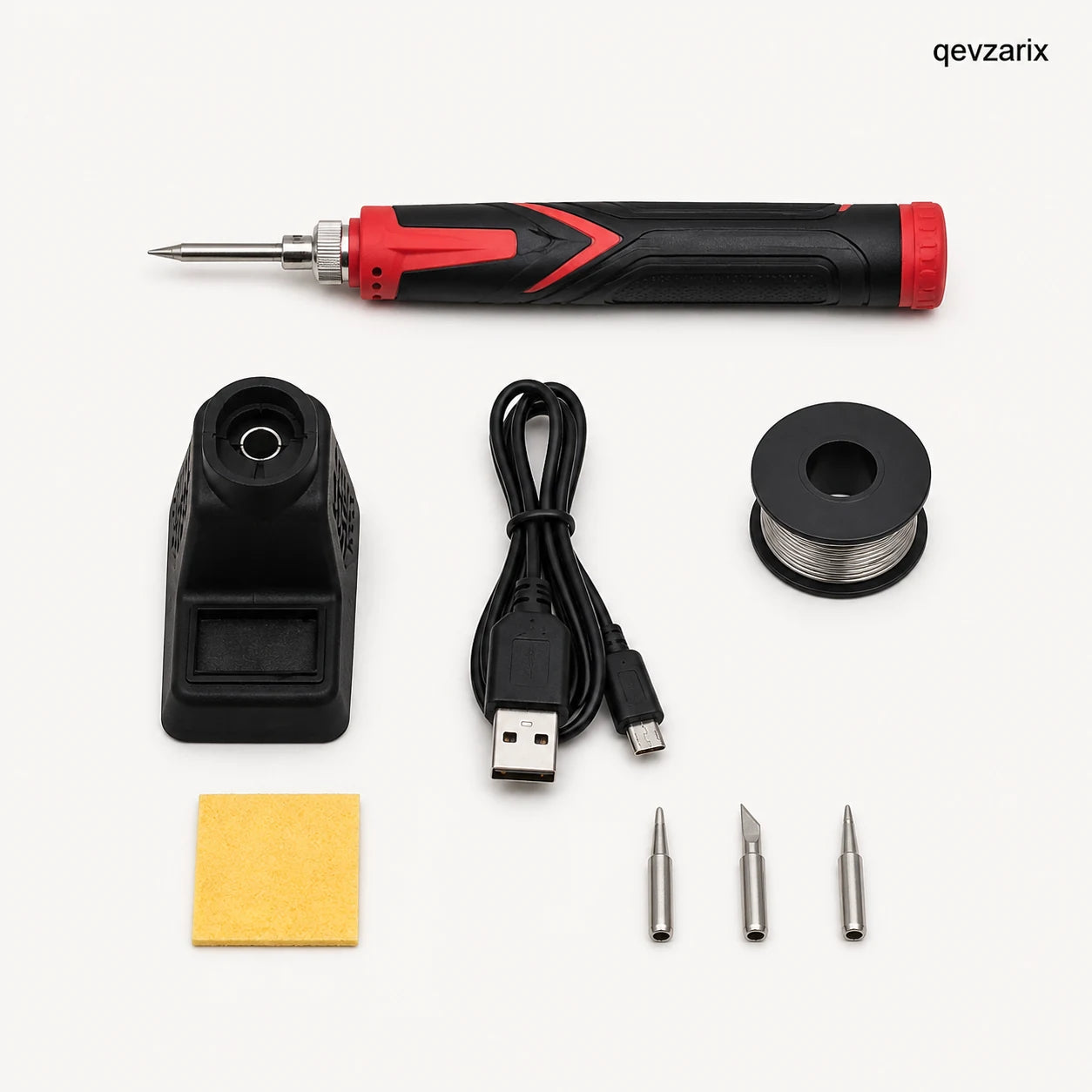 QEVZARIX soldering kit laid out with USB cable, solder wire, sponge and tips